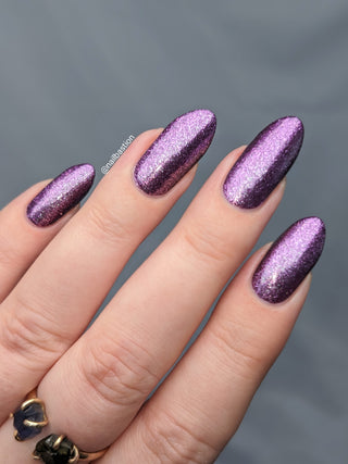 Image provided for Bee's Knees by a paid swatcher featuring the nail polish " Nevermore "