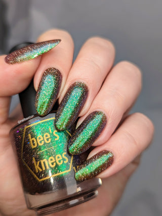 Image provided for Bee's Knees by a paid swatcher featuring the nail polish " God of Idiocy "