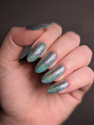 Image provided for Bee's Knees by a paid swatcher featuring the nail polish " Heartbreak "