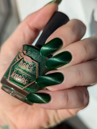 Image provided for Bee's Knees by a paid swatcher featuring the nail polish " Believing Something does not Make it True "
