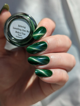 Image provided for Bee's Knees by a paid swatcher featuring the nail polish " Believing Something does not Make it True "