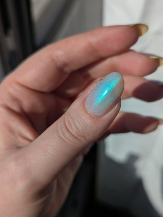 Image provided for Bee's Knees by a paid swatcher featuring the nail polish " Only Monsters Play God "