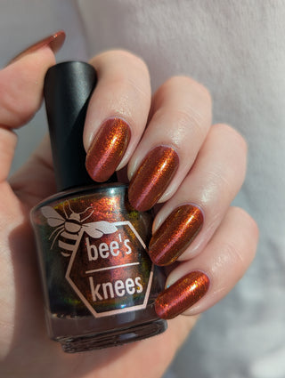 Image provided for Bee's Knees by a paid swatcher featuring the nail polish " The Dark Angel "