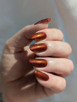 Image provided for Bee's Knees by a paid swatcher featuring the nail polish " The Dark Angel "