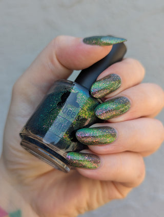 Image provided for Bee's Knees by a paid swatcher featuring the nail polish " Magiphilia "