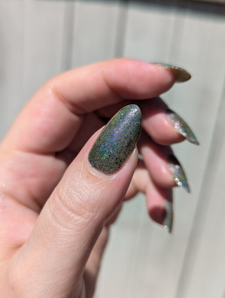 Image provided for Bee's Knees by a paid swatcher featuring the nail polish " What's a Little Blackmail Between Friends "