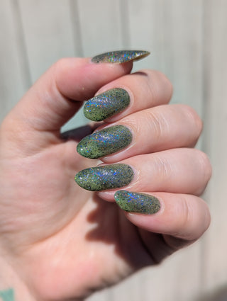 Image provided for Bee's Knees by a paid swatcher featuring the nail polish " What's a Little Blackmail Between Friends "