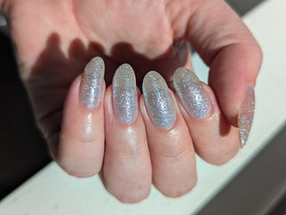 Image provided for Bee's Knees by a paid swatcher featuring the nail polish " Hold Your Unicorns "