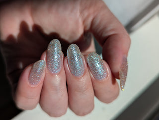 Image provided for Bee's Knees by a paid swatcher featuring the nail polish " Hold Your Unicorns "