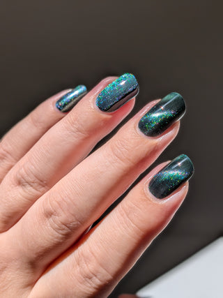 Image provided for Bee's Knees by a paid swatcher featuring the nail polish " Midnight Yoga and Seaweed "