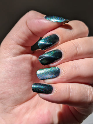 Image provided for Bee's Knees by a paid swatcher featuring the nail polish " Midnight Yoga and Seaweed "