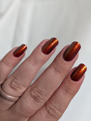 Image provided for Bee's Knees by a paid swatcher featuring the nail polish " The Bar is in Hell "