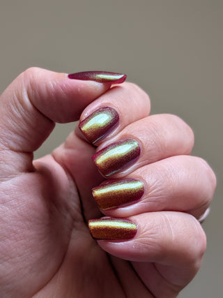 Image provided for Bee's Knees by a paid swatcher featuring the nail polish " The Bar is in Hell "