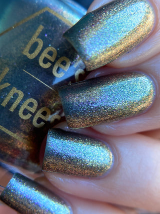 Image provided for Bee's Knees by a paid swatcher featuring the nail polish " Denial "