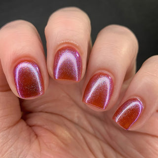 Image provided for Bee's Knees by a paid swatcher featuring the nail polish " Let's Give Them Hell "