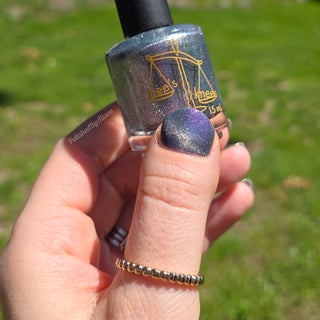 Image provided for Bee's Knees by a paid swatcher featuring the nail polish " True Power Lies in the Shadows "