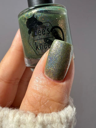 Image provided for Bee's Knees by a paid swatcher featuring the nail polish " What's a Little Blackmail Between Friends "