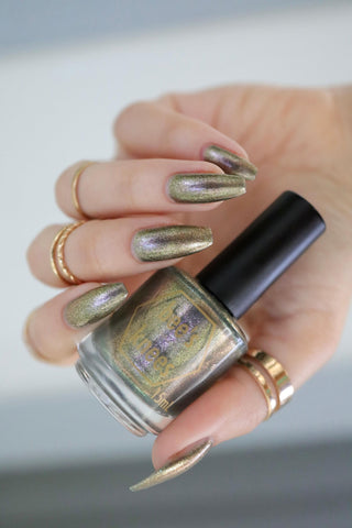 Image provided for Bee's Knees by a paid swatcher featuring the nail polish " Denial "