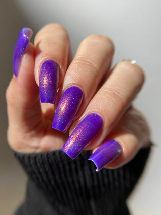 Image provided for Bee's Knees by a paid swatcher featuring the nail polish " The Great Unraveling "