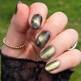 Image provided for Bee's Knees by a paid swatcher featuring the nail polish " Stormfall "