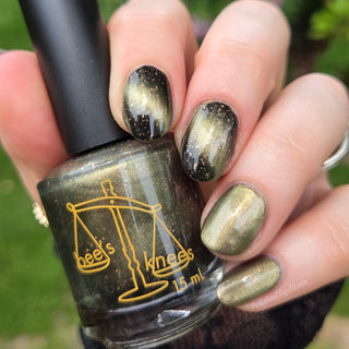 Image provided for Bee's Knees by a paid swatcher featuring the nail polish " Stormfall "