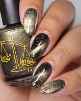 Image provided for Bee's Knees by a paid swatcher featuring the nail polish " Stormfall "