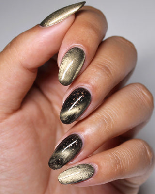 Image provided for Bee's Knees by a paid swatcher featuring the nail polish " Stormfall "