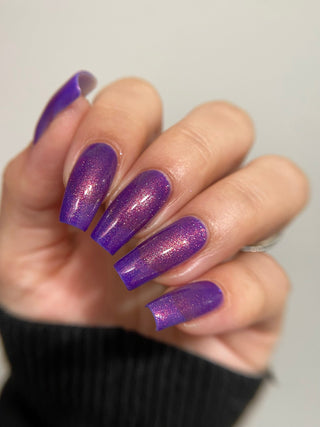 Image provided for Bee's Knees by a paid swatcher featuring the nail polish " The Great Unraveling "