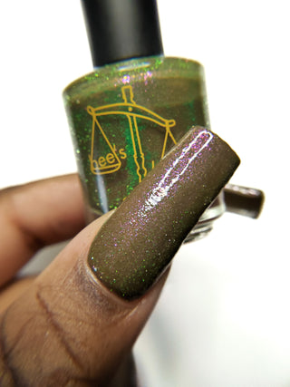 Image provided for Bee's Knees by a paid swatcher featuring the nail polish " Boil Beetle Venom "