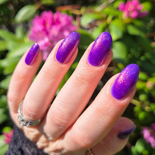 Image provided for Bee's Knees by a paid swatcher featuring the nail polish " The Great Unraveling "