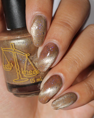 Image provided for Bee's Knees by a paid swatcher featuring the nail polish " Violentia nervus potestas "