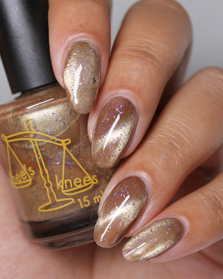 Image provided for Bee's Knees by a paid swatcher featuring the nail polish " Violentia nervus potestas "