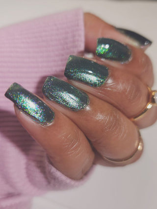 Image provided for Bee's Knees by a paid swatcher featuring the nail polish " Midnight Yoga and Seaweed "