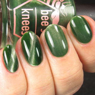 Image provided for Bee's Knees by a paid swatcher featuring the nail polish " Believing Something does not Make it True "