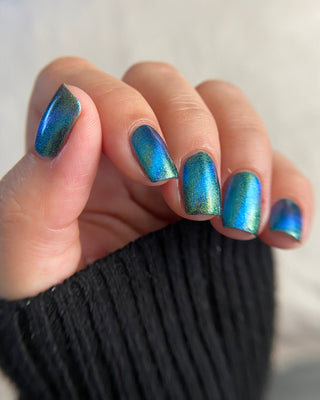 Image provided for Bee's Knees by a paid swatcher featuring the nail polish " The Pond Spirit "