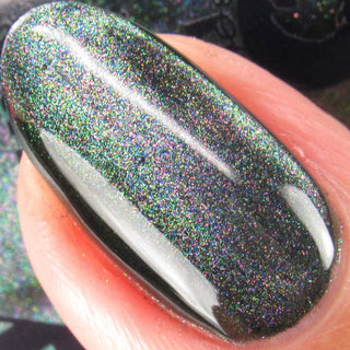 Image provided for Bee's Knees by a paid swatcher featuring the nail polish " Midnight Yoga and Seaweed "