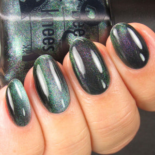 Image provided for Bee's Knees by a paid swatcher featuring the nail polish " Midnight Yoga and Seaweed "