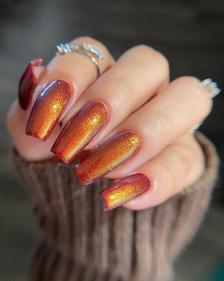 Image provided for Bee's Knees by a paid swatcher featuring the nail polish " The Bar is in Hell "