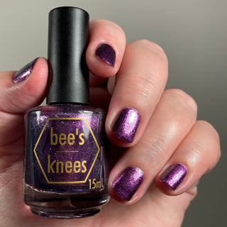 Image provided for Bee's Knees by a paid swatcher featuring the nail polish " Nevermore "