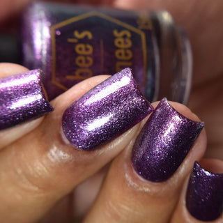 Image provided for Bee's Knees by a paid swatcher featuring the nail polish " Nevermore "