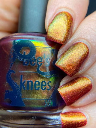 Image provided for Bee's Knees by a paid swatcher featuring the nail polish " The Bar is in Hell "