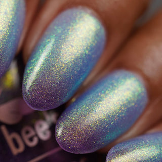 Image provided for Bee's Knees by a paid swatcher featuring the nail polish " Let the Ocean Take Me "