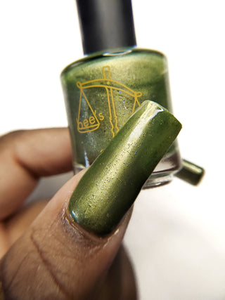 Image provided for Bee's Knees by a paid swatcher featuring the nail polish " Coercer "