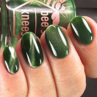 Image provided for Bee's Knees by a paid swatcher featuring the nail polish " Believing Something does not Make it True "