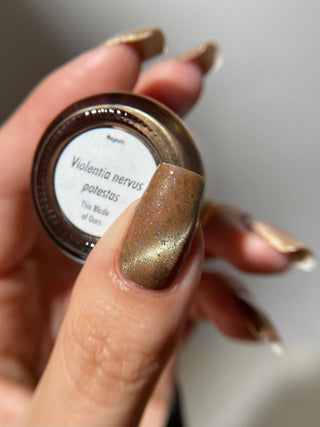 Image provided for Bee's Knees by a paid swatcher featuring the nail polish " Violentia nervus potestas "