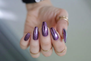 Image provided for Bee's Knees by a paid swatcher featuring the nail polish " Nevermore "