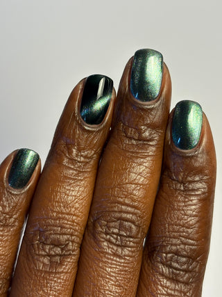 Image provided for Bee's Knees by a paid swatcher featuring the nail polish " Midnight Yoga and Seaweed "