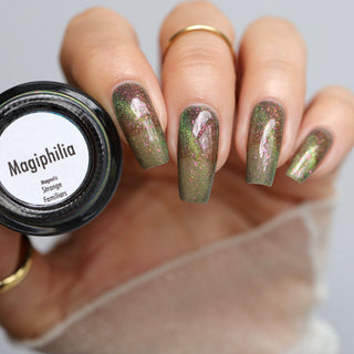 Image provided for Bee's Knees by a paid swatcher featuring the nail polish " Magiphilia "