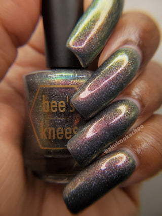 Image provided for Bee's Knees by a paid swatcher featuring the nail polish " Let Me Out "