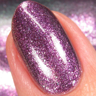 Image provided for Bee's Knees by a paid swatcher featuring the nail polish " Nevermore "